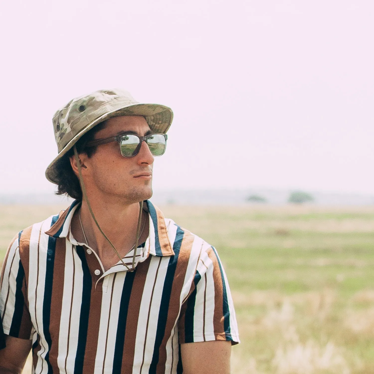 Walnut wood classic style sunglasses with semi-transparent grey frame and silver mirrored polarized lenses